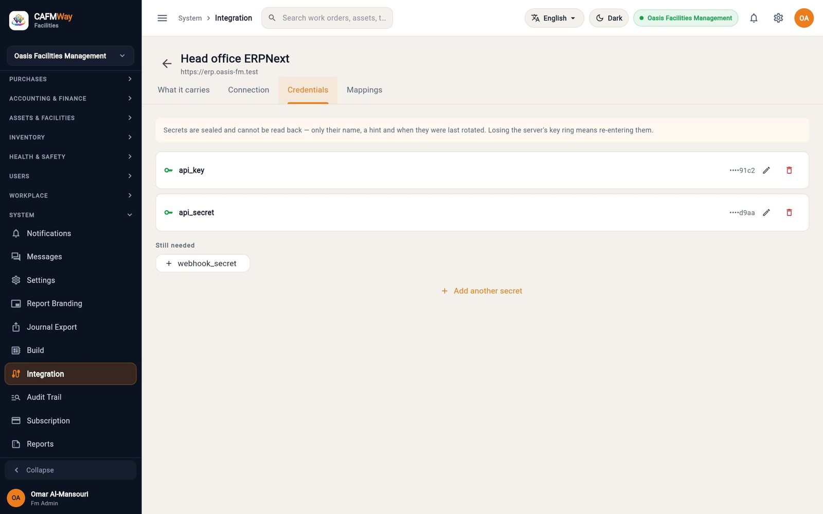 The Credentials tab after saving: each secret shows only its name and a masked hint.